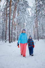 Mother and son enjoying beautiful winter day