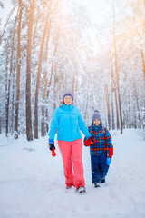 Mother and son enjoying beautiful winter day