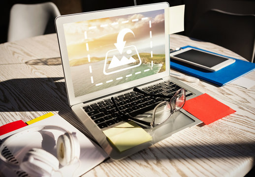Laptop Mockup on Round Desk with Glasses