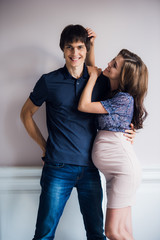 Beautiful pregnant woman with her confident smiling husband