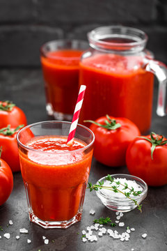 Fresh tomato juice in glass. Vegetable drink