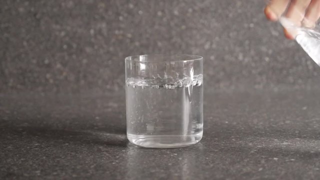 glass water and woman hand drinking healthy life