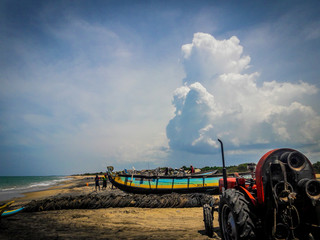 Beach side people working (fishery)