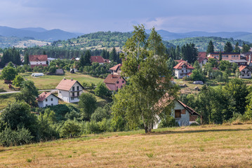 Fototapeta na wymiar Aerial view of Sirogojno village in mountains of Zlatibor area in Serbia