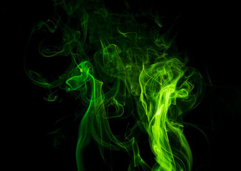 Green smoke on black background