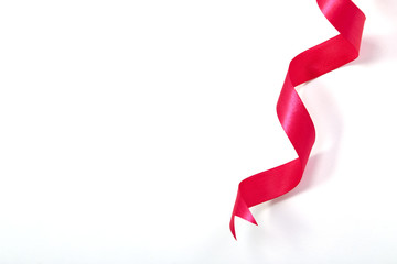 Pink ribbon on a white background