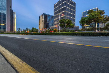 night view of Empty asphalt road through modern city, China