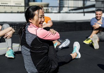People exercising at fitness gym