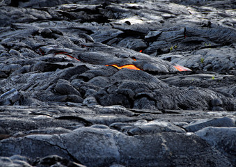 Hot lava and molten rock with heat blurring the background, Kilauea shield volcano, Big Island of Hawaii