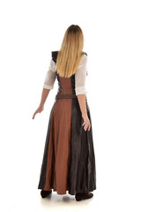 full length portrait of girl wearing brown  fantasy costume, standing pose with back to the camera on white studio background. 
