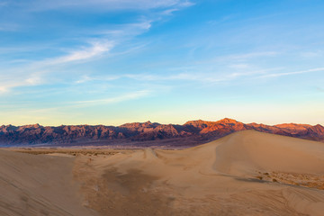Fototapeta na wymiar Sunset over Mesquite Flat Sand Dunes in Death Valley National Park, California, United States