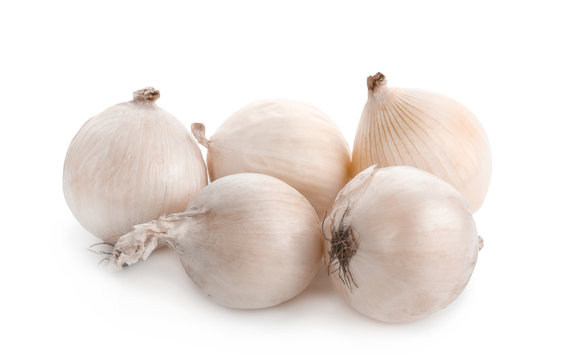 Fresh whole onions on white background