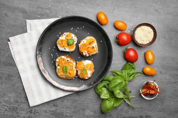 Composition with tasty bruschettas on table