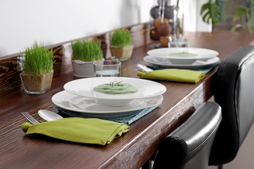 Tasty puree on plate. Table setting in vegetarian cafe