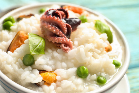 Dish with tasty seafood risotto, closeup