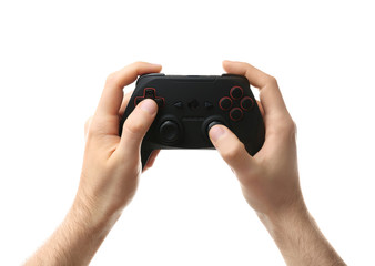 Man holding video game controller on white background © Africa Studio
