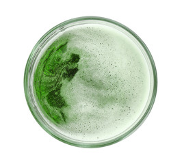 Glass of green beer on white background. Saint Patrick's day celebration