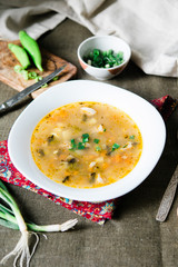 Рlate of potato soup. Rustic lunch with fresh vegetables and soup