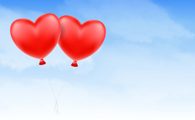 Fototapeta na wymiar two love heart balloon floating in blue sky