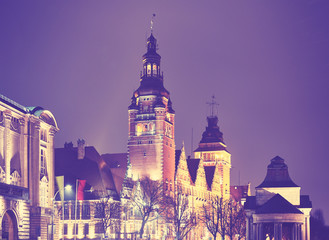 Vintage toned picture of Szczecin (Stettin) City at night, Poland.