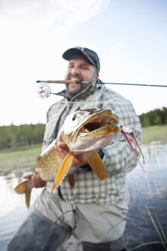 Fisherman showing big fish