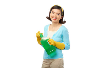 Fototapeta na wymiar Pretty Housewife with Detergent Bottle
