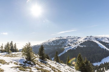 snowy mountain landscape with sun shine light