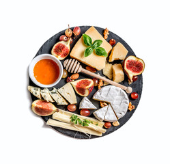Fototapeta na wymiar Cheese plate served with nuts and honey