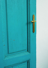 Detail of a turquoise door