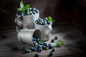 Delicious blueberry on old wooden rustic floor