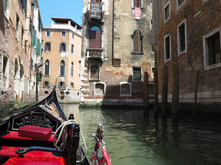 Fototapeta na wymiar 20.06.2017, Venice, Italy: View from gondola to historic buildings and canals