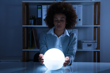 Businesswoman Hand On Crystal Ball