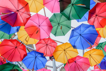 Rainbow colored umbrellas