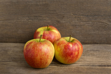 Healthy apples on wooden background