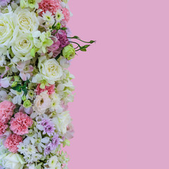 Beautiful bouquet flowers with different types of colorful flowers on pink background