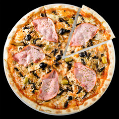 Delicious Capricciosa pizza with bacon, cheese and olives isolated on black background. Top view, flat lay