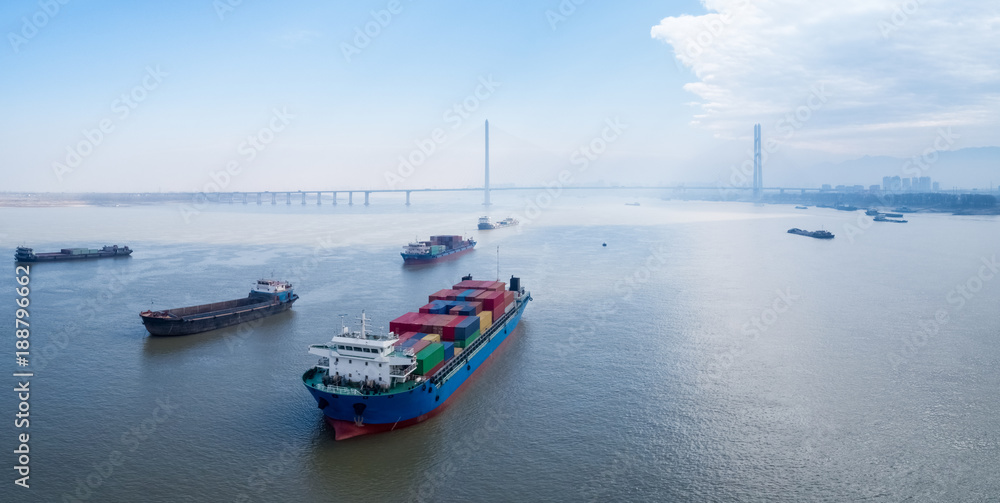 Sticker container ships on yangtze river , water transport concept