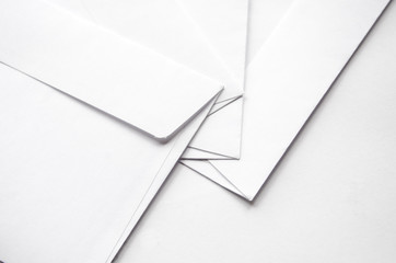 white blank envelopes on white background
