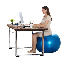 Smiling Young Woman Working On Computer