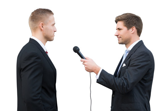 News Reporter Asking Questions To Businessman