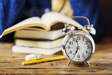 Stydying concept: student preparing late for his exams