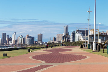  Paved Promenade Against City Skyline in Durban South Africa - obrazy, fototapety, plakaty