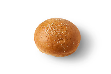 Round bun with sesame for a hamburger. Isolate on white background.