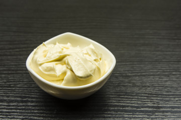 Bowl with mayonnaise.