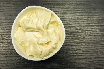Bowl with mayonnaise. View from above.