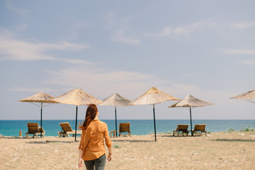 Cirali sand beach and a lonely female traveler