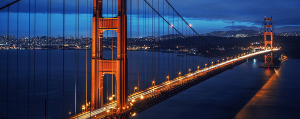 View of famous Golden Gate bridge by night