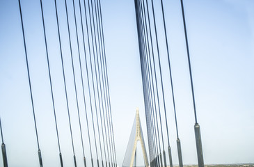 Naklejka premium Driving car along the Guadiana International Bridge