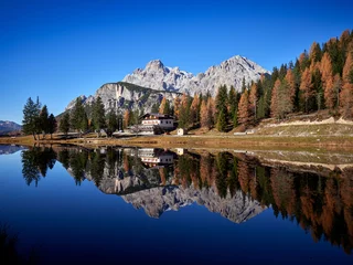 Fotobehang Great view of the lake Antorno in National Park Tre Cime di Lavaredo, Tyrol, Italy © bereta