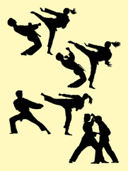 Silhouette of couple exercising karate martial art 03. Good use for symbol, logo, web icon, mascot, sign, or any design you want.
